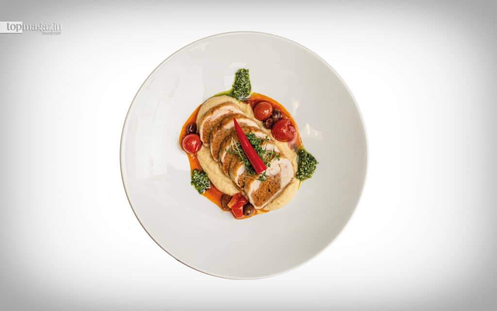 Schwertfisch, gefüllt mit Calamaretti und ’Nduja auf Kichererbsen-Püree mit sauren Bohnen