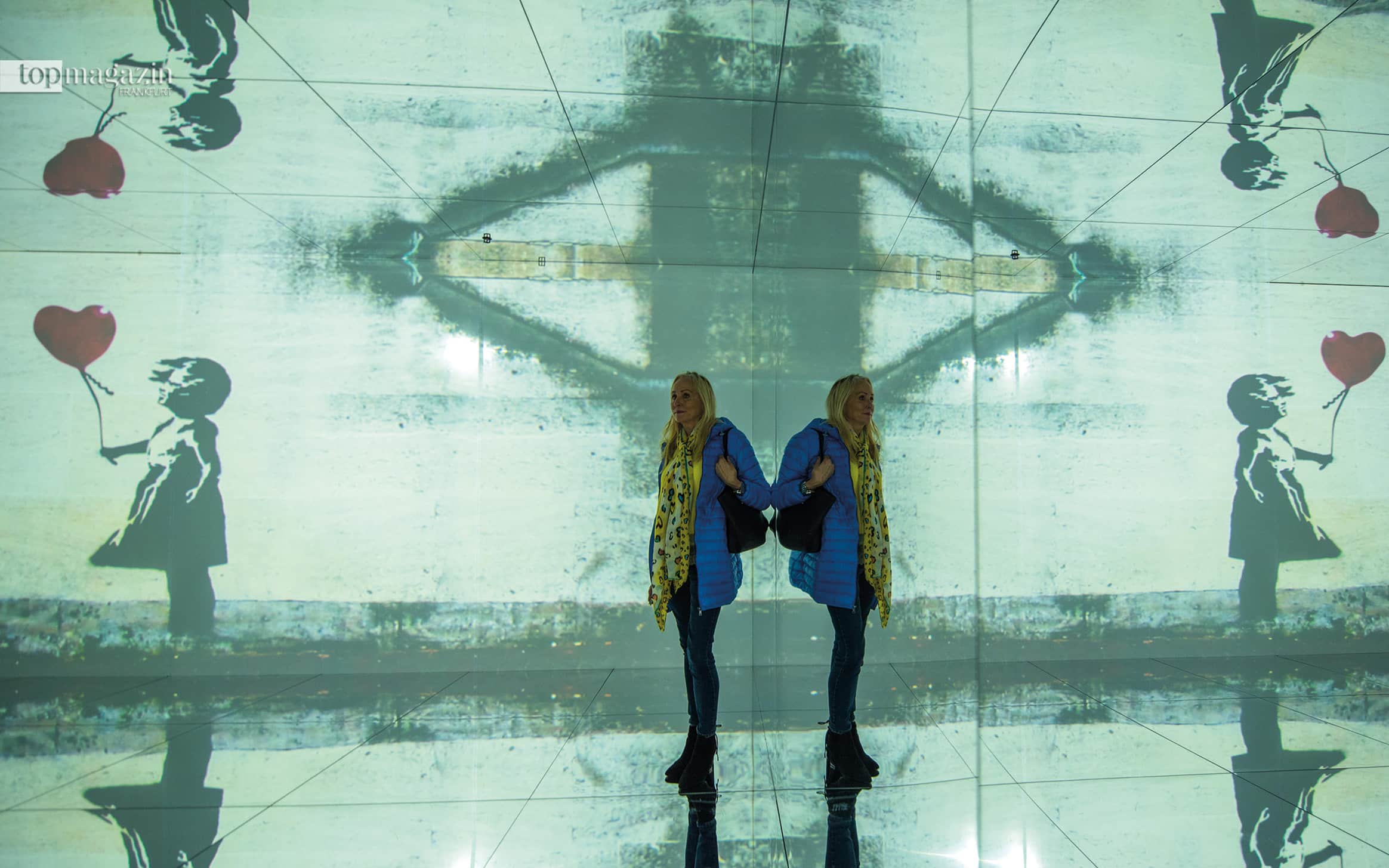 Eine Videoinstallation mit Banksy-Kunstwerken