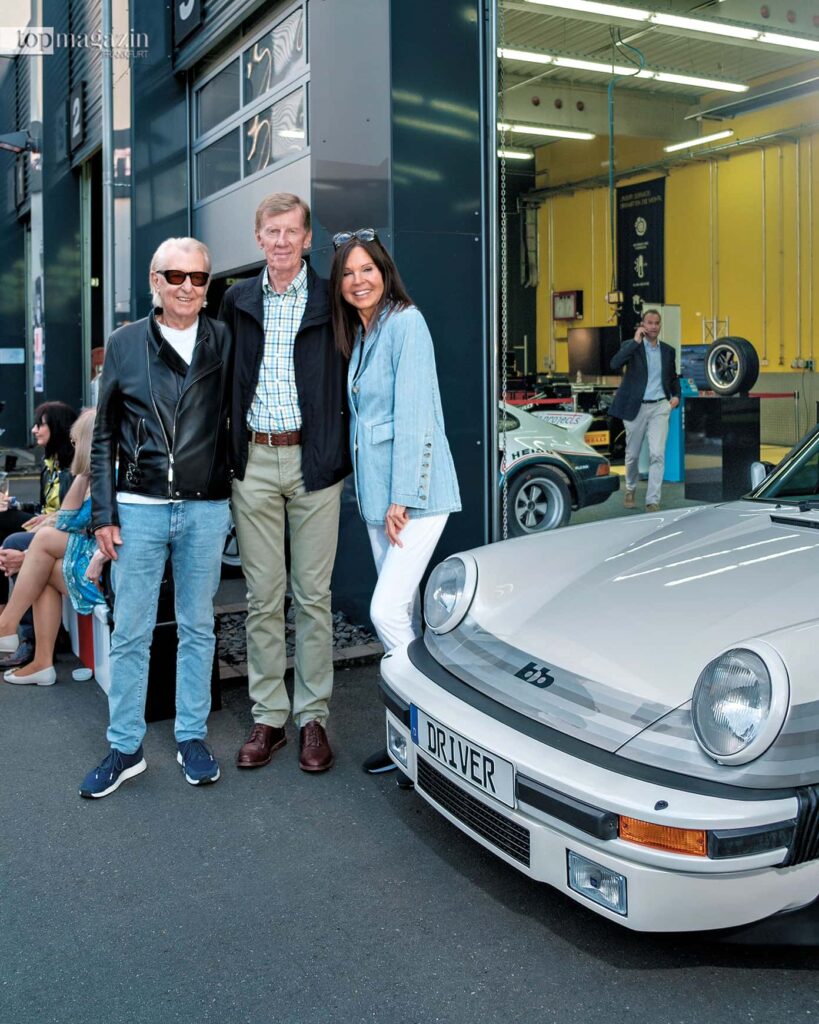 Tuning-Legende Rainer Buchmann mit Rallye-Ikone Walter Röhrl und Kathrin Buchmann im Driver Center Frankfurt