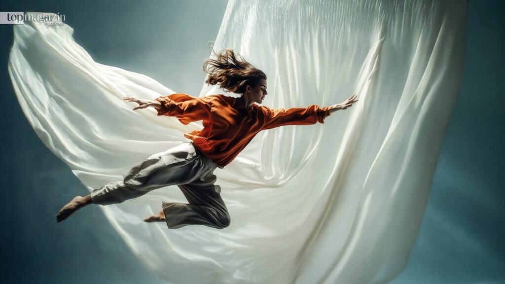 Eine schwebende Person in dynamischer Pose mit einem fließenden Tuch symbolisiert die neue Life Balance als harmonische Verbindung von Beruf und Privatleben.